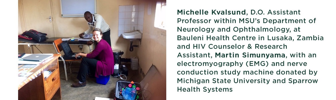 Michelle Kvalsund, D.O. Assistant Professor within MSU’s Department of Neurology and Ophthalmology, at Bauleni Health Centre in Lusaka, Zambia and HIV Counselor & Research Assistant, Martin Simunyama, with an electromyography (EMG) and nerve conduction study machine donated by Michigan State University and Sparrow Health Systems